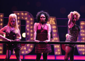 Audra Bryant, Vanita Harbour, and Kathryn Murphy in Lyric Theatre's 2012 production of SWEET CHARITY. Photo by Wendy Mutz
