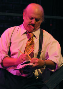 Stephen Hilton in Lyric Theatre's 2012 production of SWEET CHARITY. Photo by Wendy Mutz.