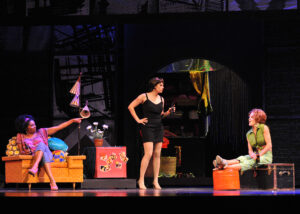 Vanita Harbour, Milena Govich, and Kathryn Murphy in Lyric Theatre's SWEET CHARITY. Photo by Wendy Mutz.